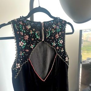Vintage velvet dress with decorative front and back cutout. ECOTE. Size S.